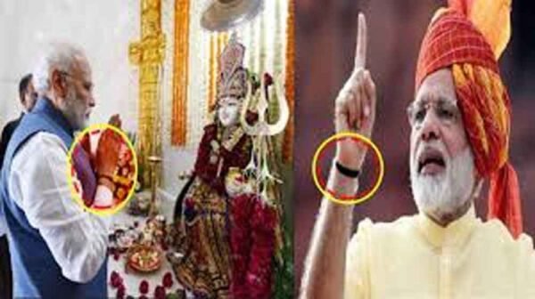 प्रधानमंत्री मोदी की कलाई पर बंधा काला